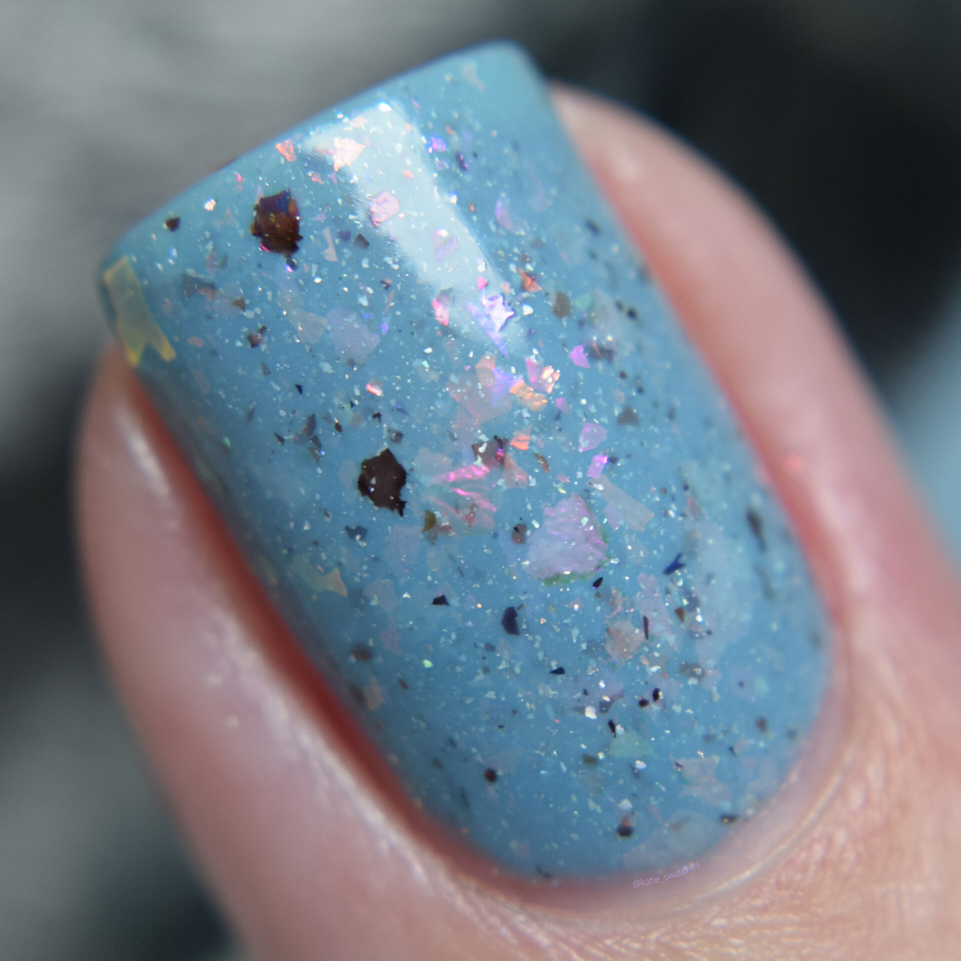 Penelope Luz - Crazy Rick nail polish swatch Polish Pickup PPU August 2020 - baby blue with colourful iridescent flakies and a tiny touch of multichrome flakes