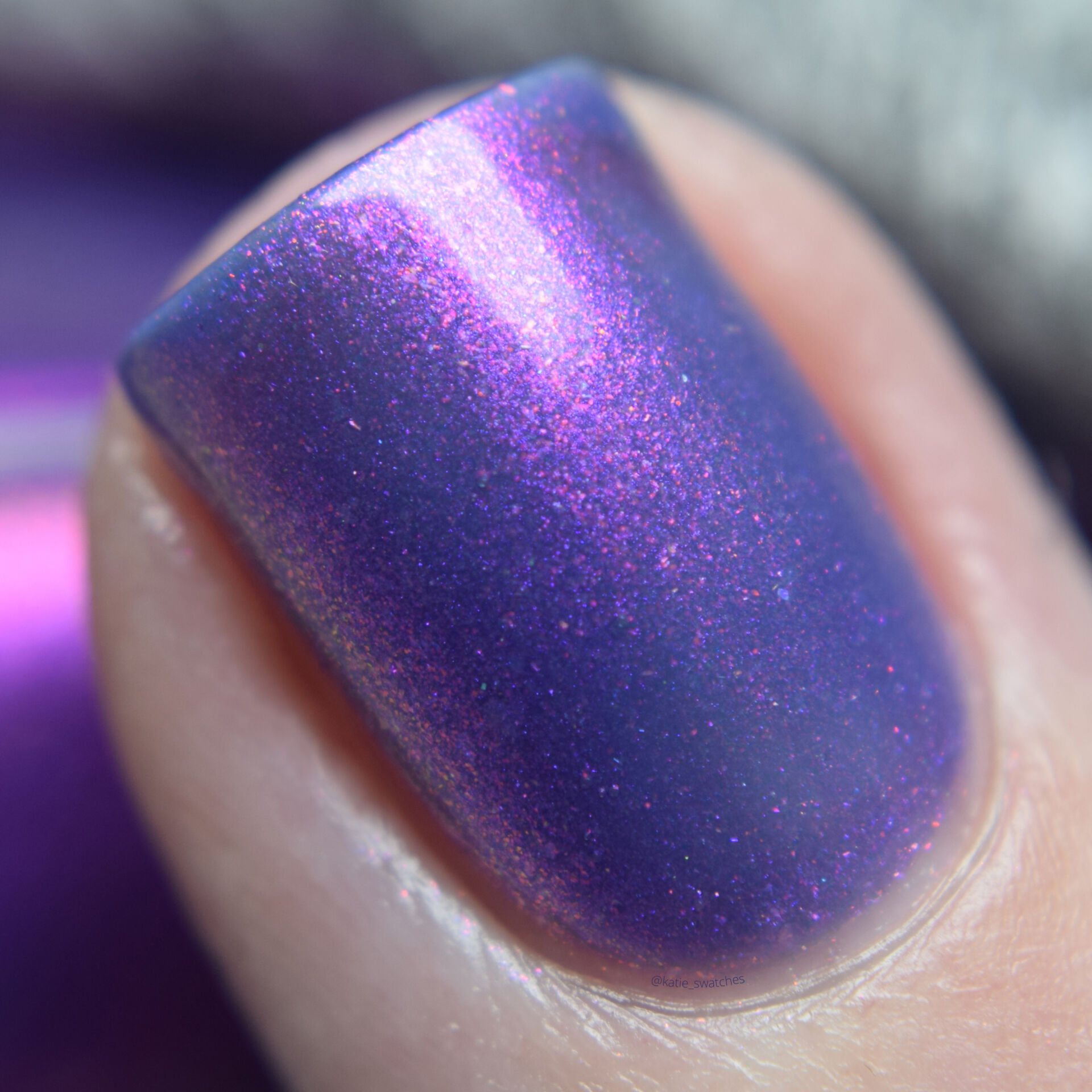 Bedford and Grove - Seven! Seven! Seven! nail polish swatch macro. A deep violet based nail polish and is packed with pink and purple aurora shimmer.