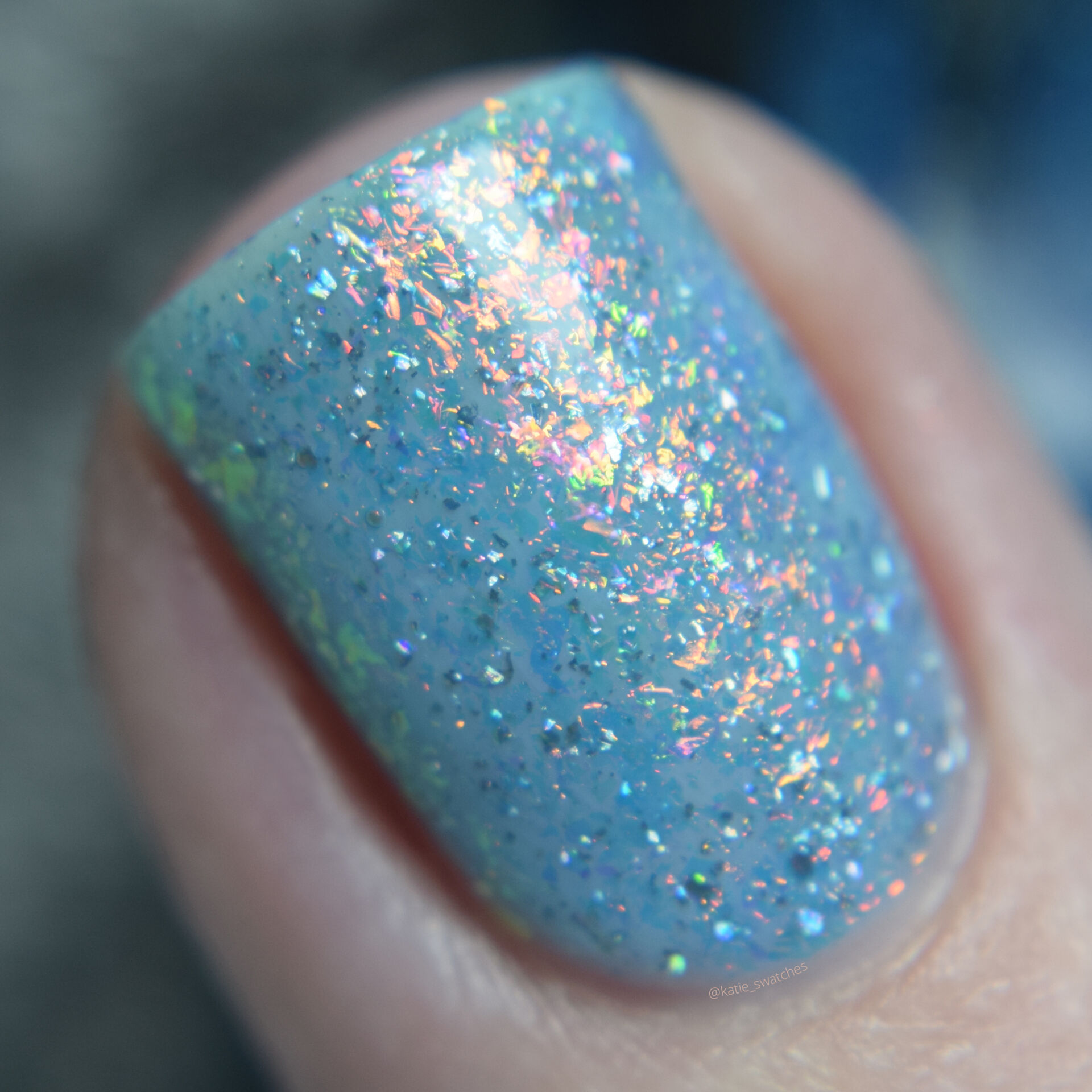 Polished for Days Fire Rainbow nail polish sheer turquoise with rainbow iridescent flakes. Polish Pickup August 2020 Exclusive nail polish swatch