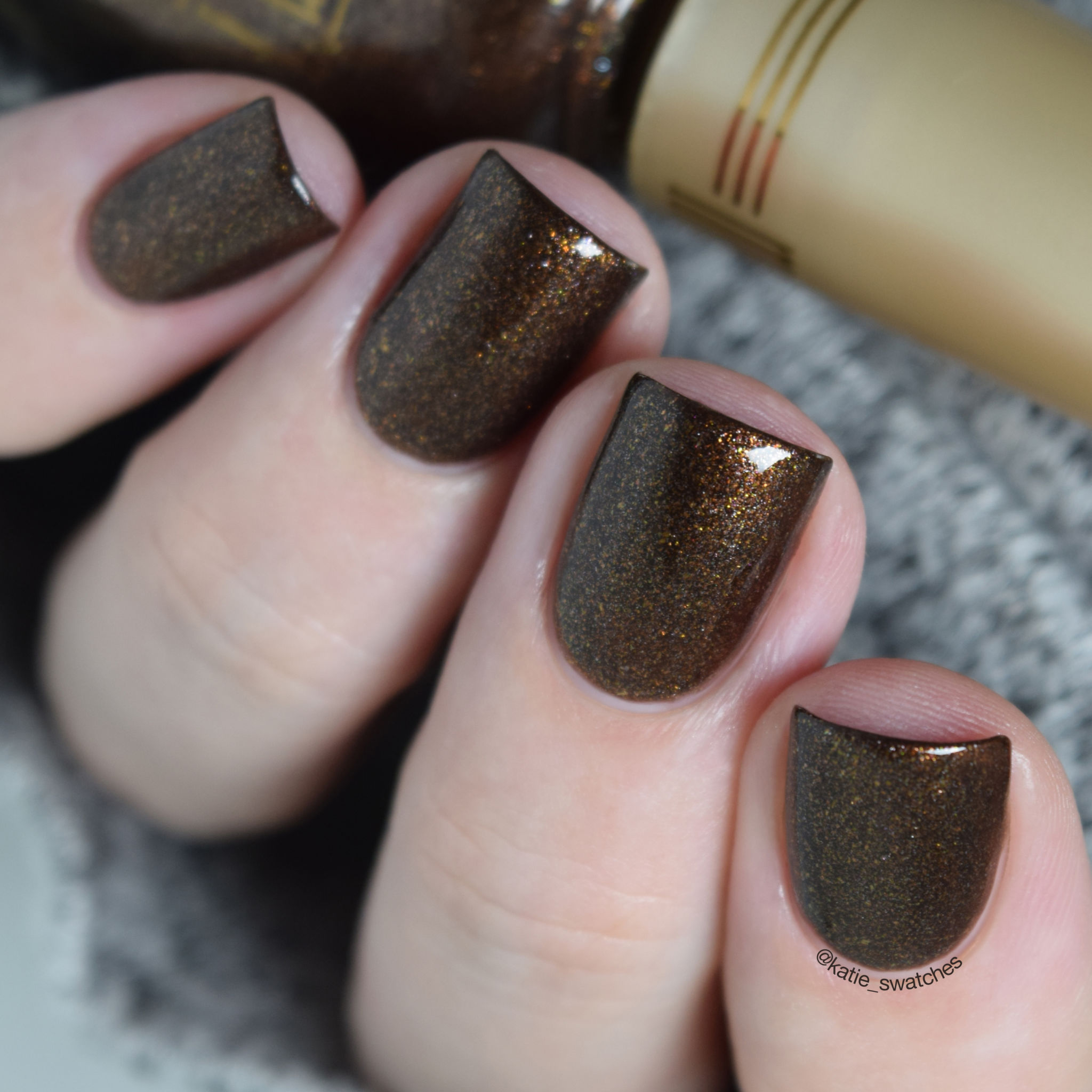 Milani Chocolate Sprinkles brown holographic nail polish swatch