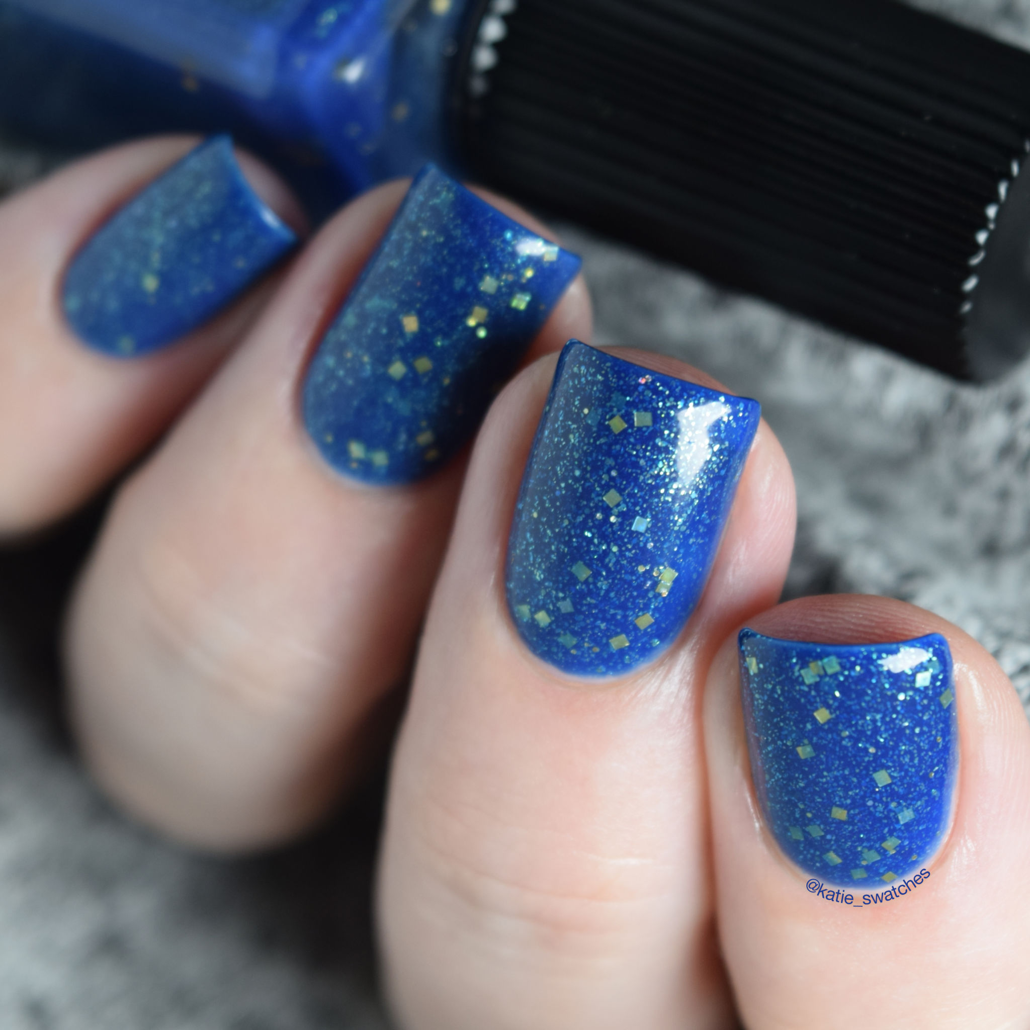 Cadillacquer Night Clouds indie nail polish swatch - blue green glitter