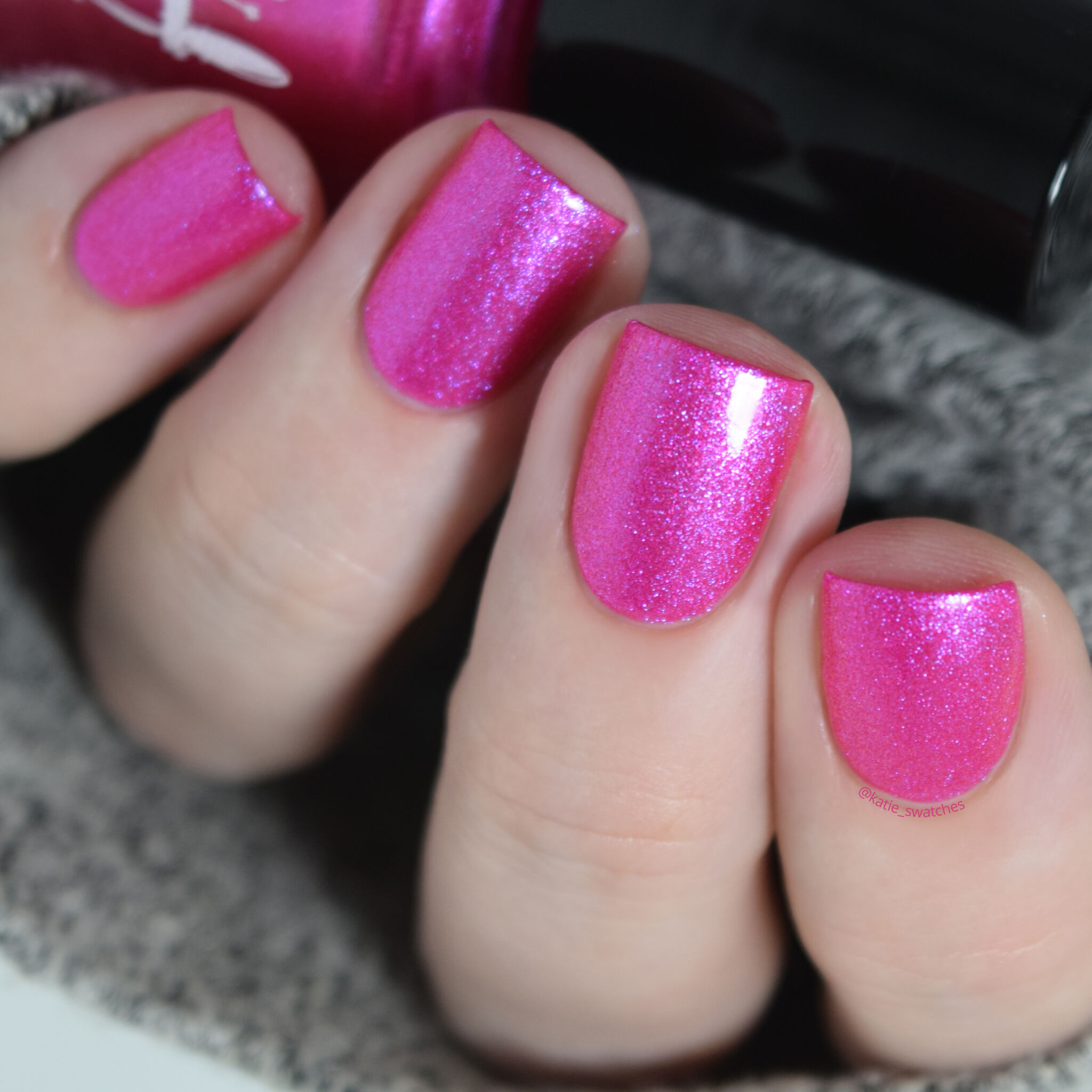 Girly Bits - Electric Boobs nail polish swatch. Fuchsia pink matte nail polish with a pink/purple shimmer.