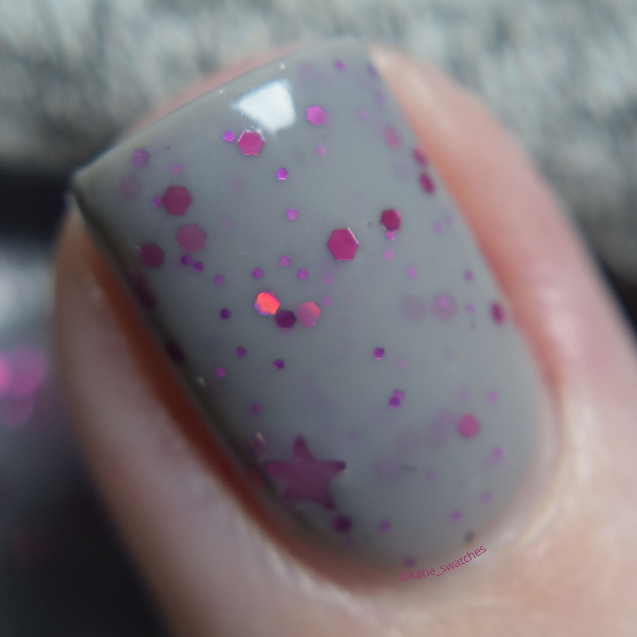 My Indie Polish - In The Beginning nail polish swatch macro Polish Pickup PPU March 2020. Grey crelly nail polish with metallic pink glitters