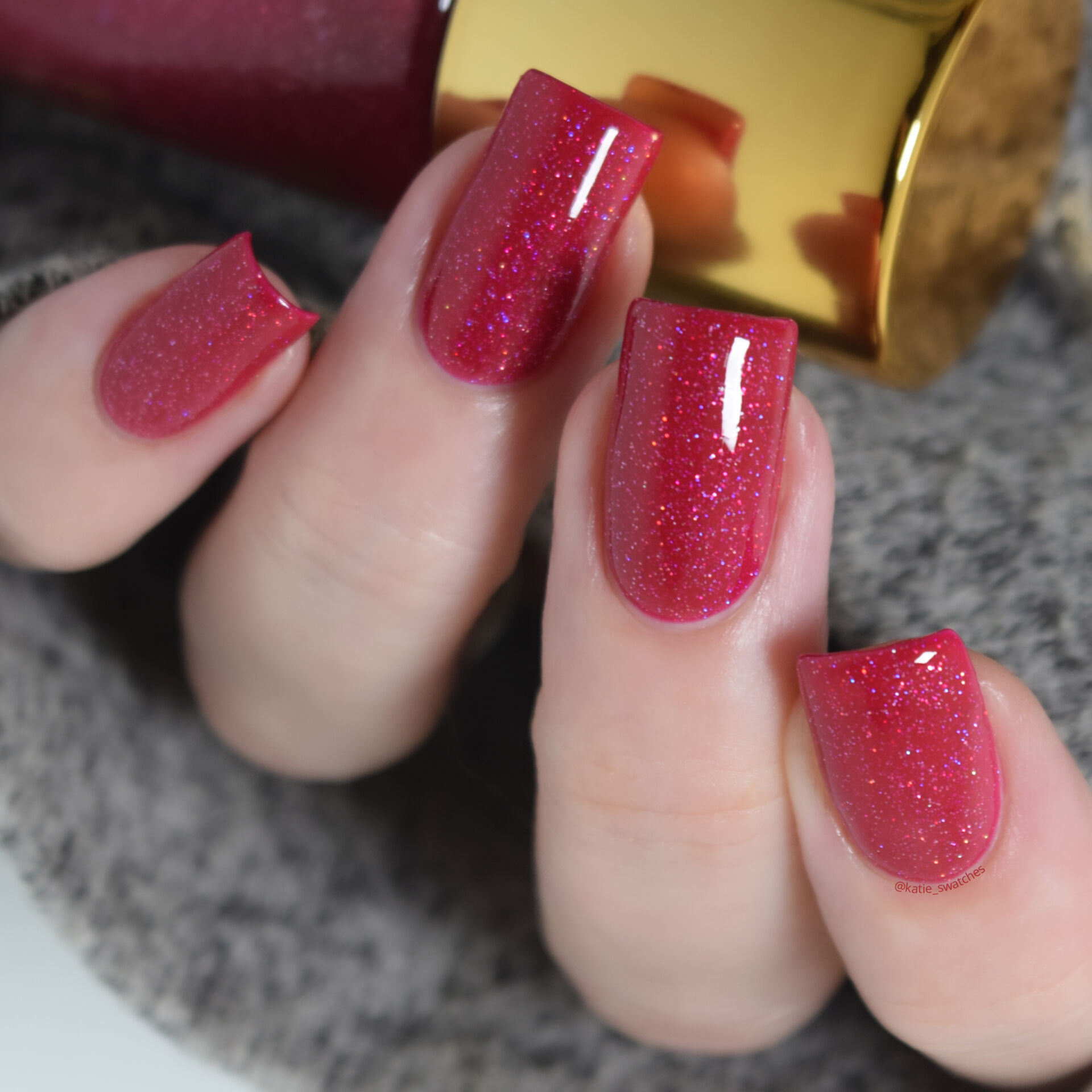 Tripe O Polish - Ooni raspberry jelly nail polish with holographic glitter swatch