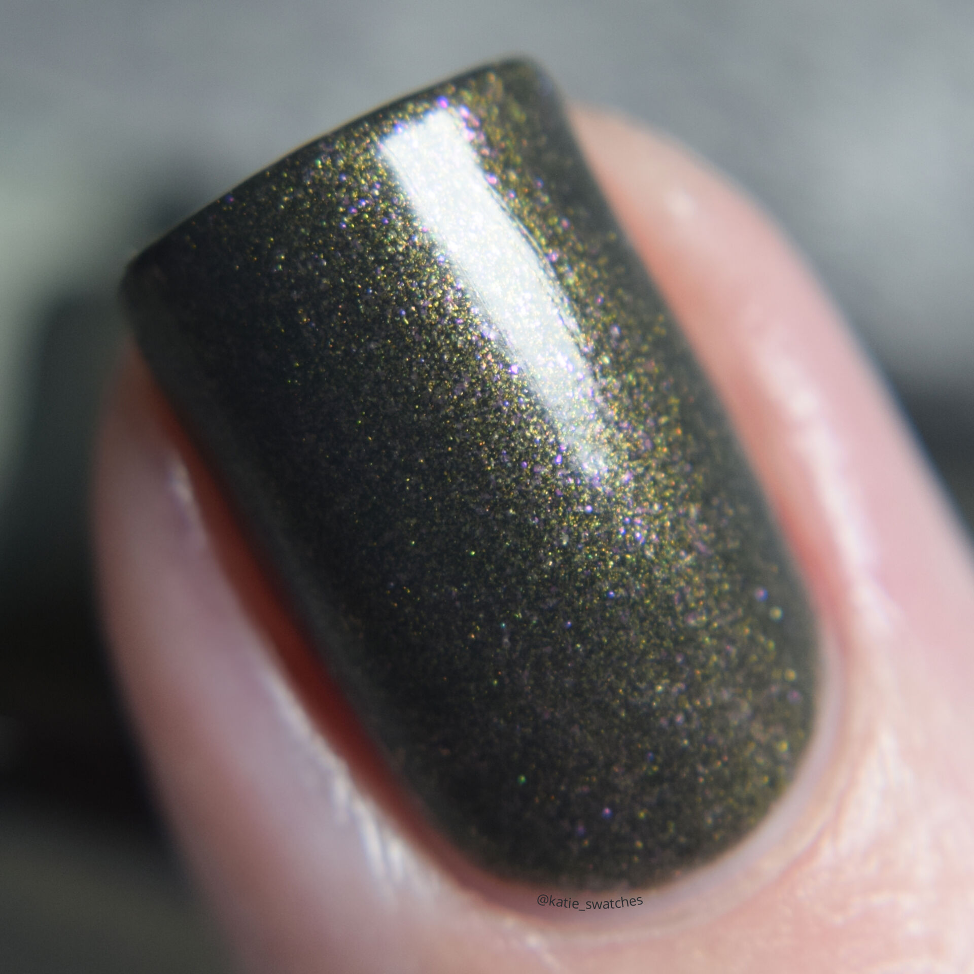 Rescue Beauty Lounge RBL Anne olive green nail polish with gold/pink shimmer. nail polish swatch macro