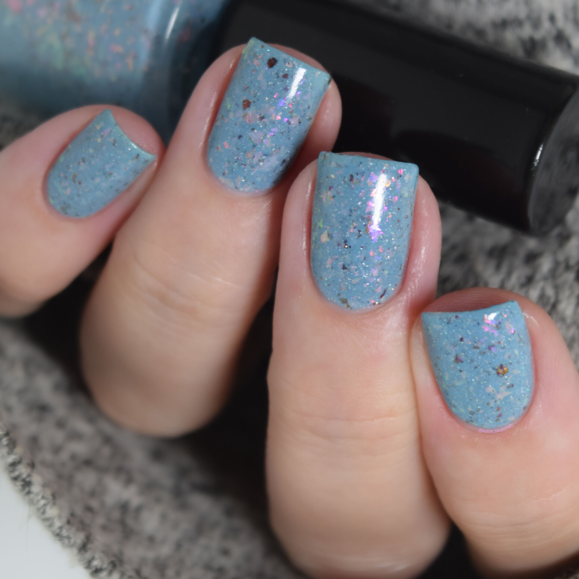 Penelope Luz - Crazy Rick nail polish swatch Polish Pickup PPU August 2020 - baby blue with colourful iridescent flakies and a tiny touch of multichrome flakes